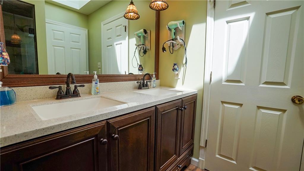 236 1/2 Meridian Road Butler, PA 16001 - Photo 13 of 24 a bathroom with a sink and a mirror