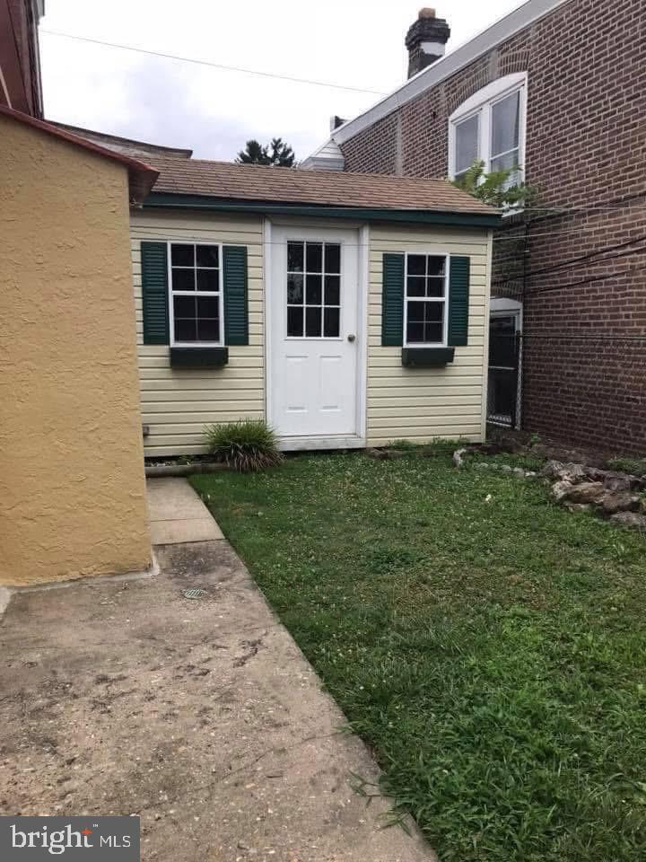 450 Seville Street Philadelphia, PA 19128 - Photo 13 of 14 a view of a house with a yard
