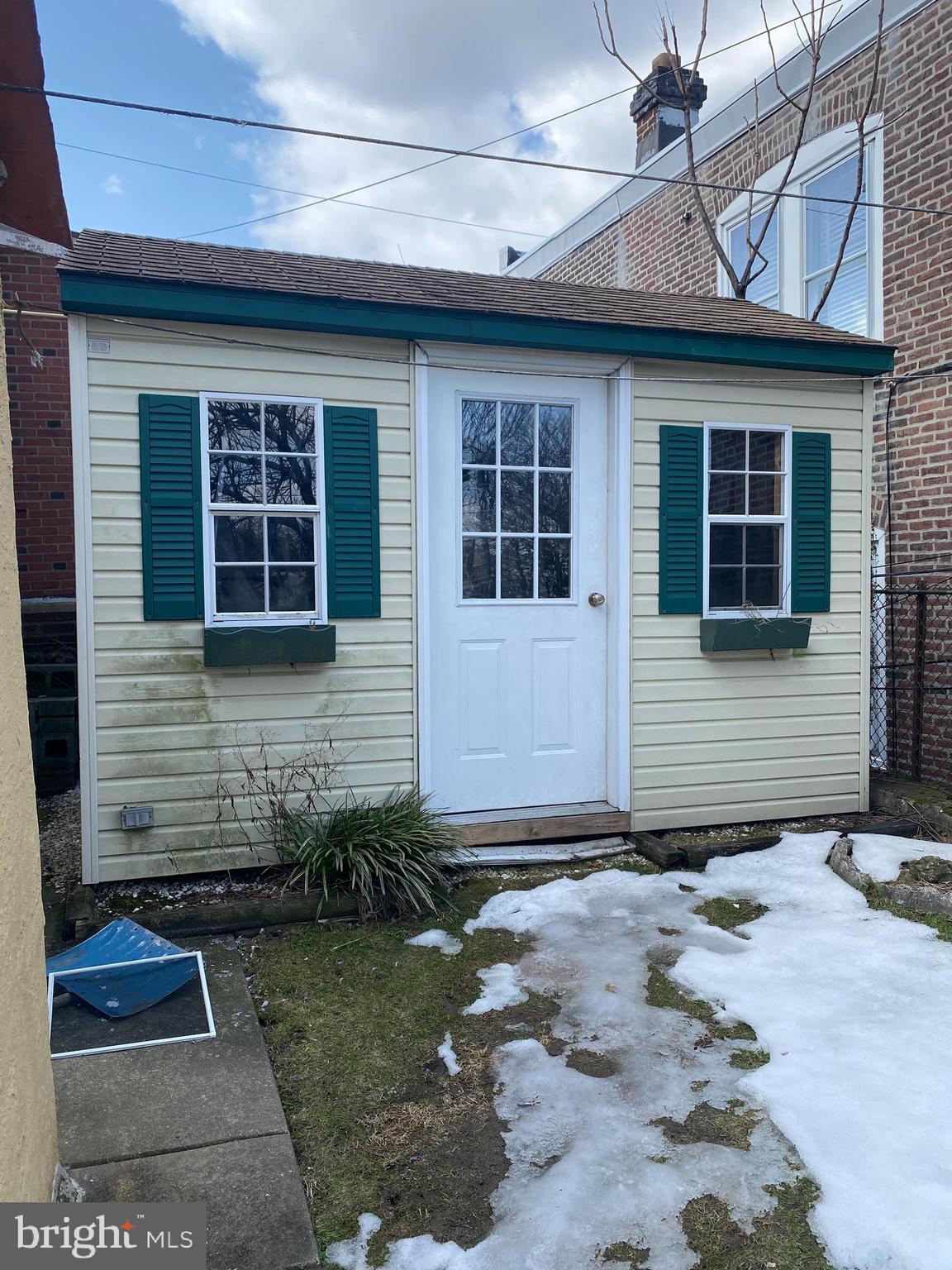 450 Seville Street Philadelphia, PA 19128 - Photo 14 of 14 a front view of a house with garden