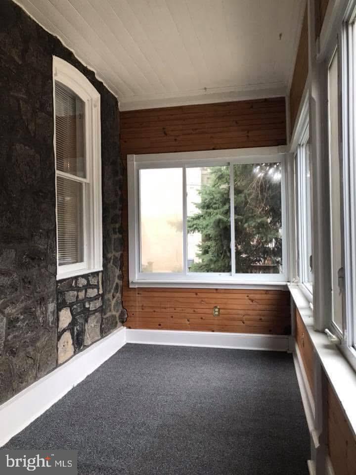450 Seville Street Philadelphia, PA 19128 - Photo 2 of 14 a view of bathroom with bathtub and windows