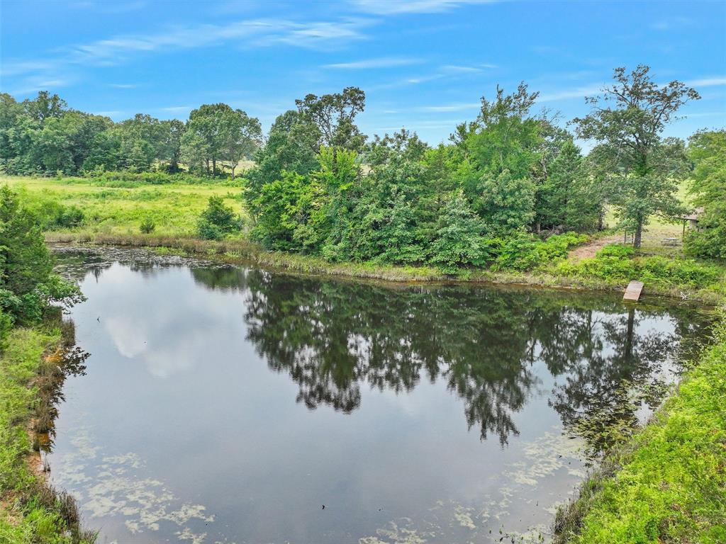 37100 County Road Sumner, TX 75486 - Photo 26 of 40 a view of a lake with outdoor space