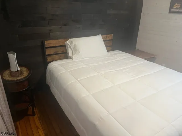 a living room with furniture and windows