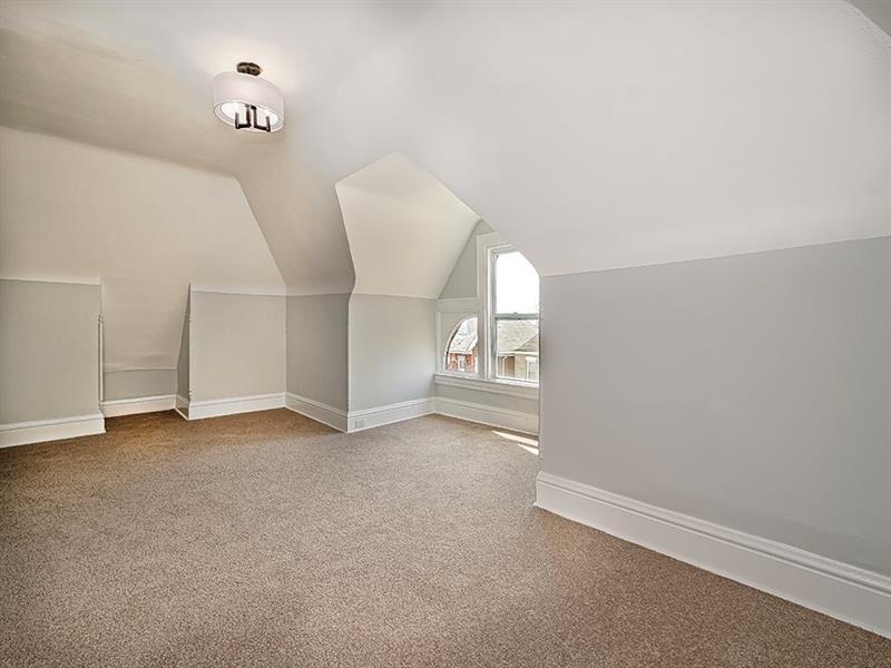 923 Adelaide Street Pittsburgh, PA 15219 - Photo 30 of 32 an empty room with windows