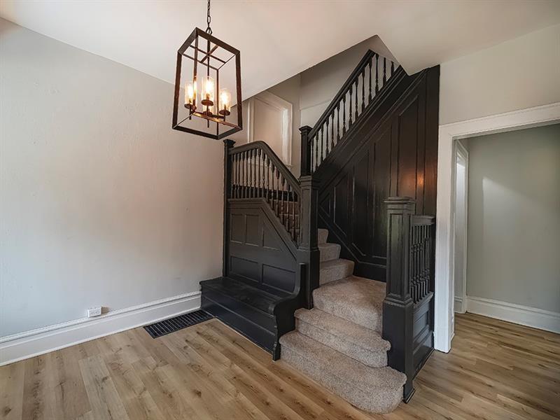 923 Adelaide Street Pittsburgh, PA 15219 - Photo 3 of 32 a view of entryway with wooden floor