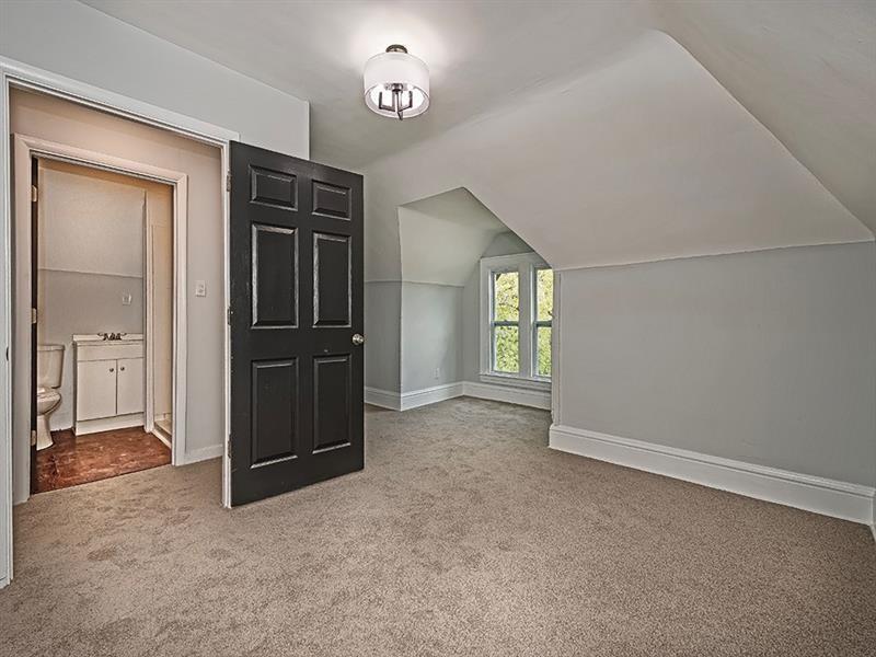 923 Adelaide Street Pittsburgh, PA 15219 - Photo 31 of 32 an empty room with windows and closet