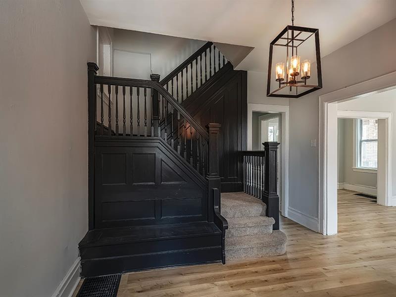 923 Adelaide Street Pittsburgh, PA 15219 - Photo 5 of 32 a view of entryway and hall with wooden floor