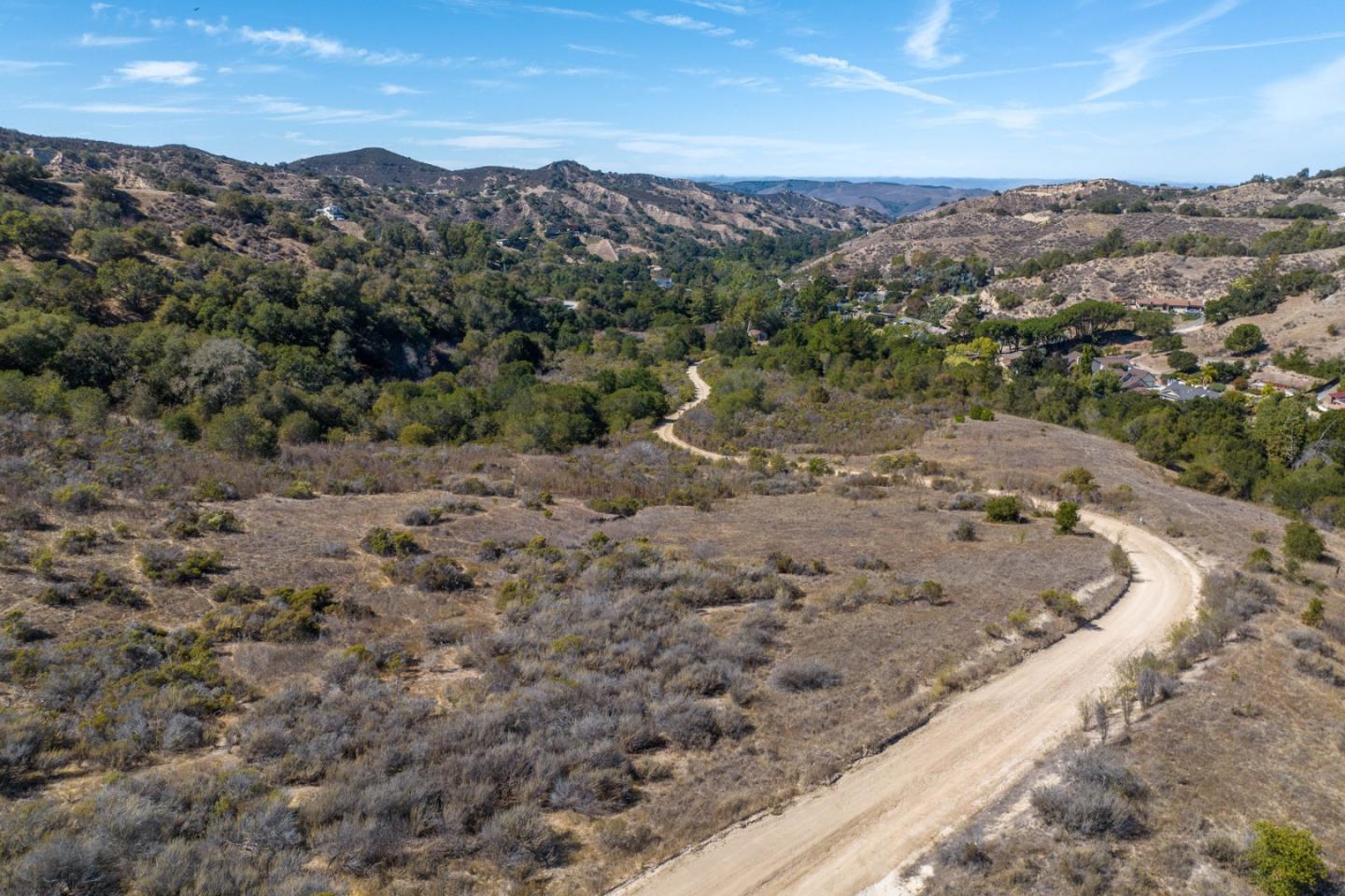286 San Benancio Road Salinas, CA 93908 - Photo 8 of 15 a view of a dry yard with mountains in the background