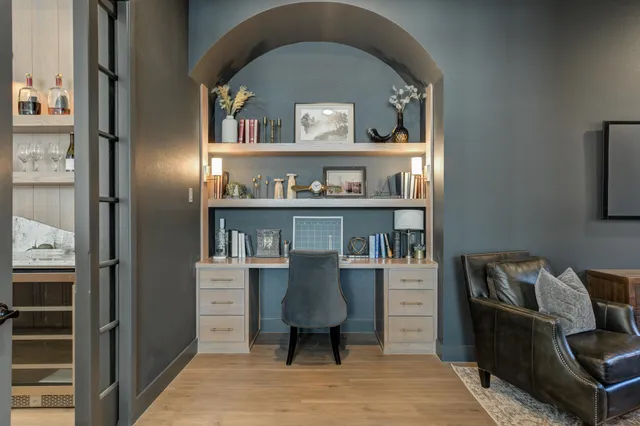 a kitchen with a sink and cabinets