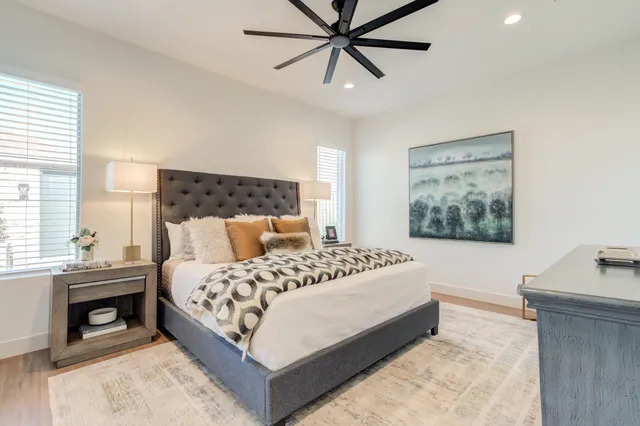 a room with pool table and a large window