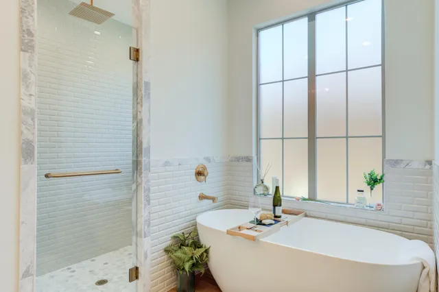 a view of a patio with a table and chairs