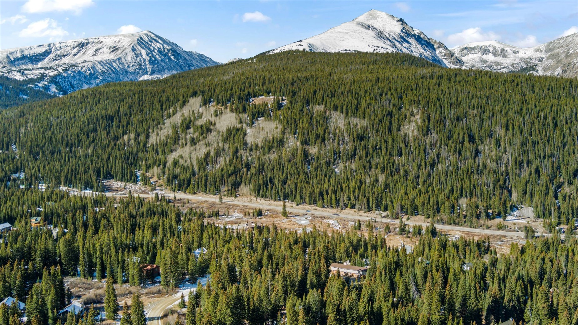 283 Range Road, Unit 1 Breckenridge, CO 80424 - Photo 11 of 11 Quandary Peak (center of the image) and the surrounding trail system is just 5 minutes from this condo. Northstar mountain is to the left of Quandary.
