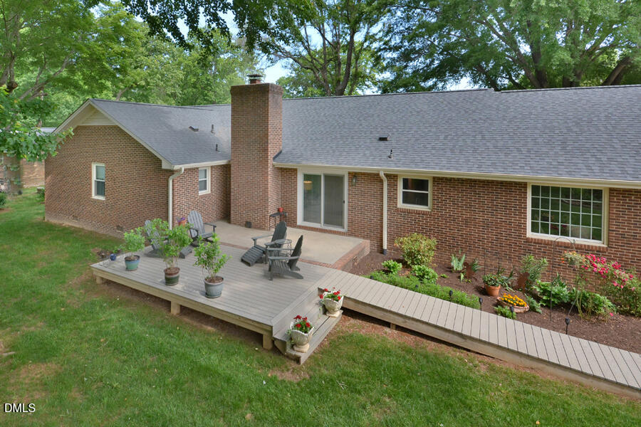 313 Andover Road Durham, NC 27712 - Photo 33 of 36 a view of a house with backyard and garden