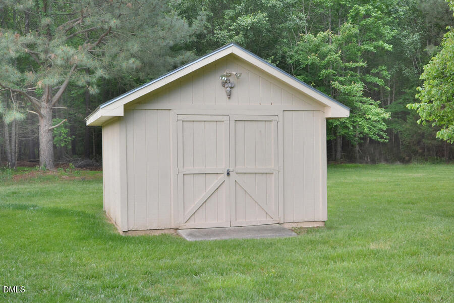 313 Andover Road Durham, NC 27712 - Photo 35 of 36 a view of backyard of house with green space