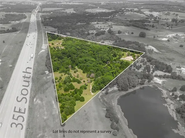 a view of a garden with a pathway