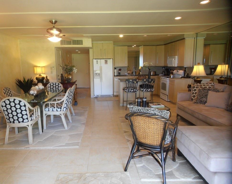 12 South Kihei Road, Unit G5 Kihei, HI 96753 - Photo 1 of 28 a room with lots of chairs and mirrors