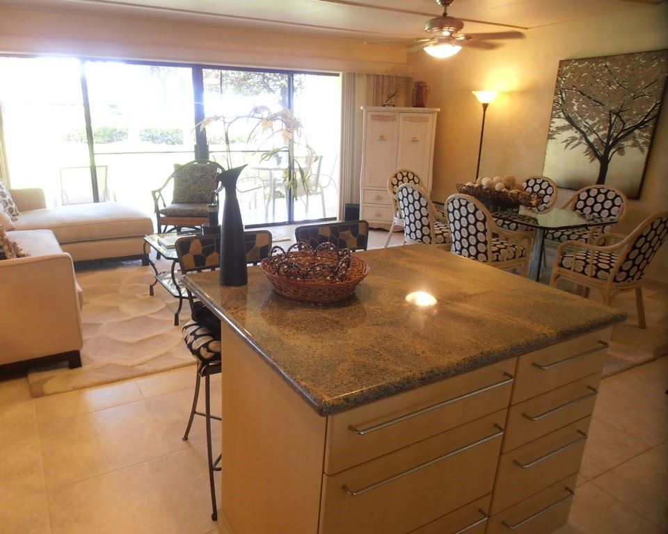 12 South Kihei Road, Unit G5 Kihei, HI 96753 - Photo 14 of 28 a room with furniture and two large window