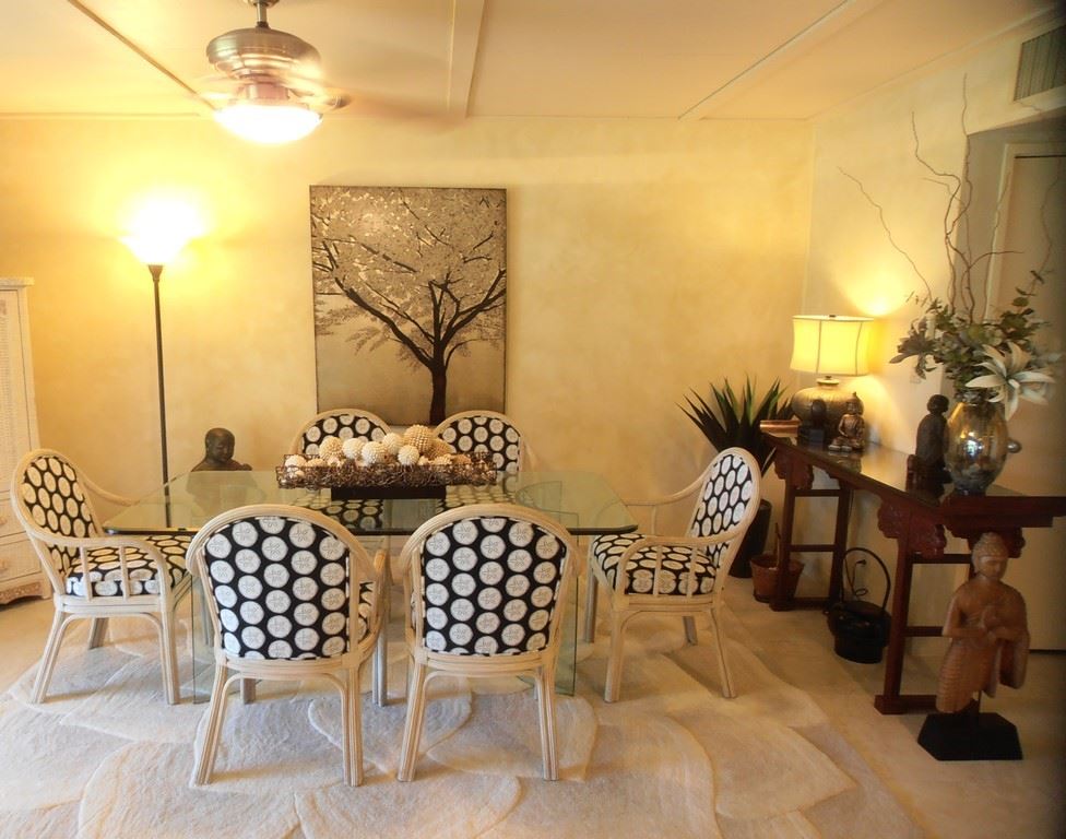 12 South Kihei Road, Unit G5 Kihei, HI 96753 - Photo 15 of 28 a view of a chairs and table in the patio