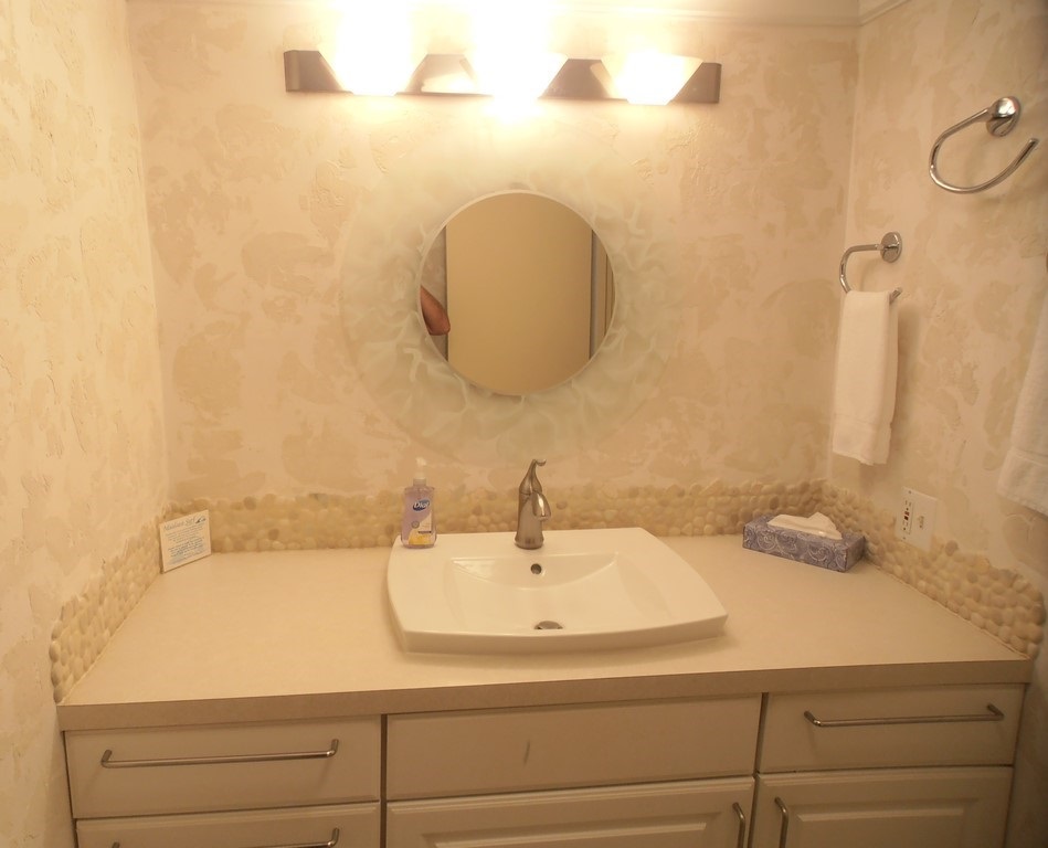 12 South Kihei Road, Unit G5 Kihei, HI 96753 - Photo 21 of 28 a bathroom with a sink and a mirror