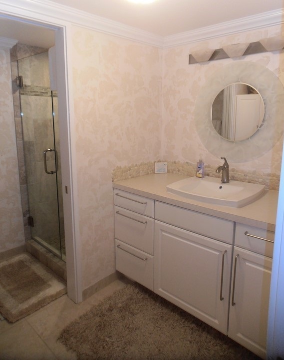12 South Kihei Road, Unit G5 Kihei, HI 96753 - Photo 4 of 28 a spacious bathroom with a double vanity sink and a mirror