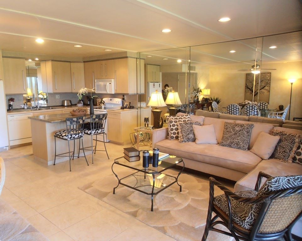 12 South Kihei Road, Unit G5 Kihei, HI 96753 - Photo 7 of 28 a living room with lots of furniture and a view of dining room
