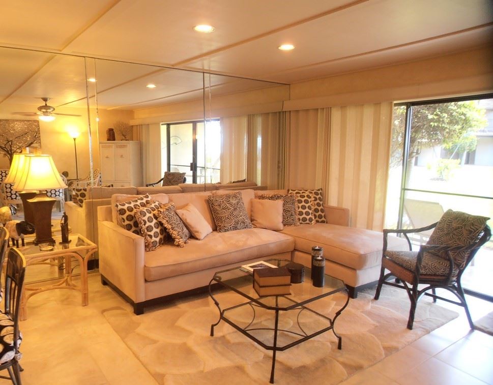 12 South Kihei Road, Unit G5 Kihei, HI 96753 - Photo 8 of 28 a living room with furniture and a large window