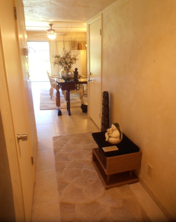 12 South Kihei Road, Unit G5 Kihei, HI 96753 - Photo 9 of 28 a living room with furniture and wooden floor