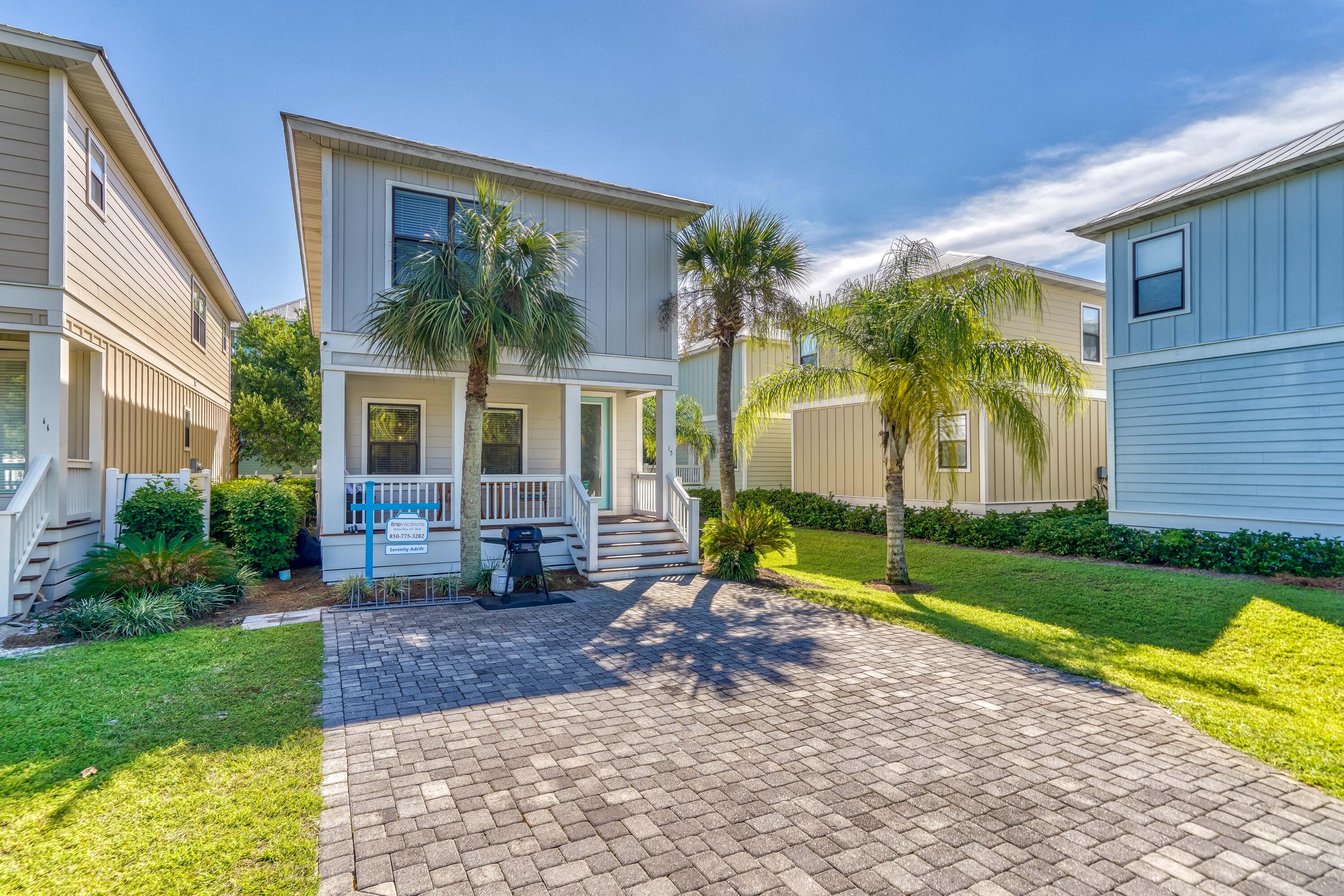 15 Asher Way Santa Rosa Beach, FL 32459 - Photo 1 of 57 a front view of a house with garden