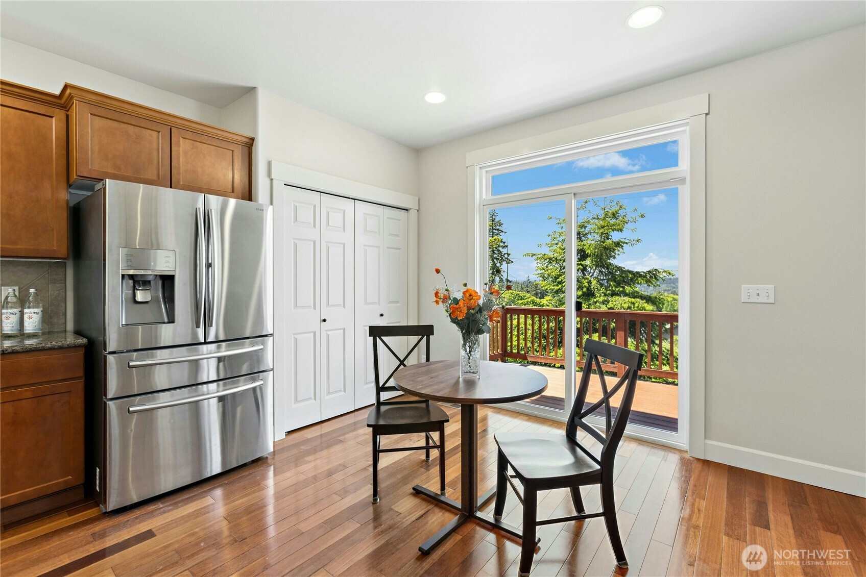 22624 43rd Drive Southeast Bothell, WA 98021 - Photo 11 of 36 a kitchen with stainless steel appliances a refrigerator and a dining table