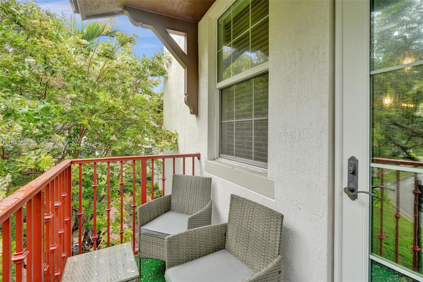 11898 Southwest 25th Court, Unit 103 Miramar, FL 33025 - Photo 22 of 40 Second floor balcony off living area