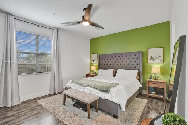 a bedroom with a bed and dresser