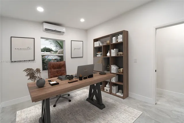 a view of a workspace with furniture