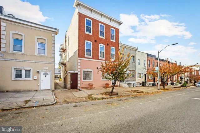 a view of a building along the street