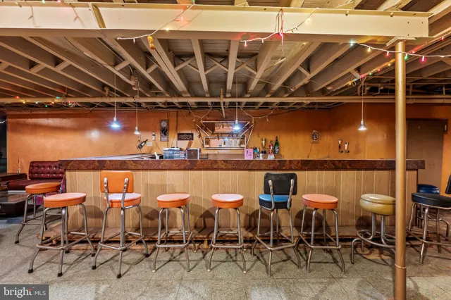 a view of a chairs and table in a patio