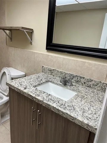 a close view of sink and microwave
