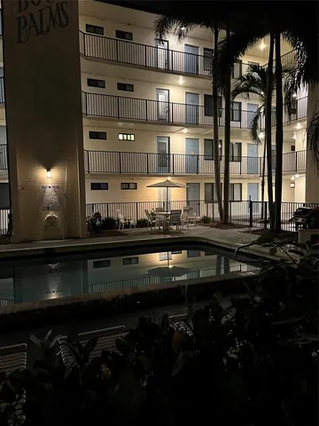 a kitchen with a sink and a stove