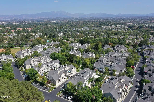 an aerial view of a city with lots of residential buildings