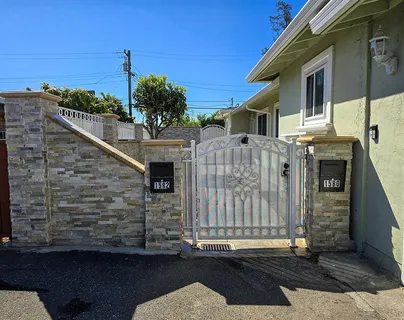 a view of a house with a street