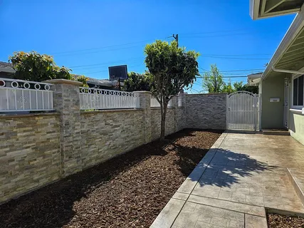 a view of a pathway both side of building