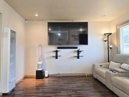 a view of livingroom with furniture and empty room