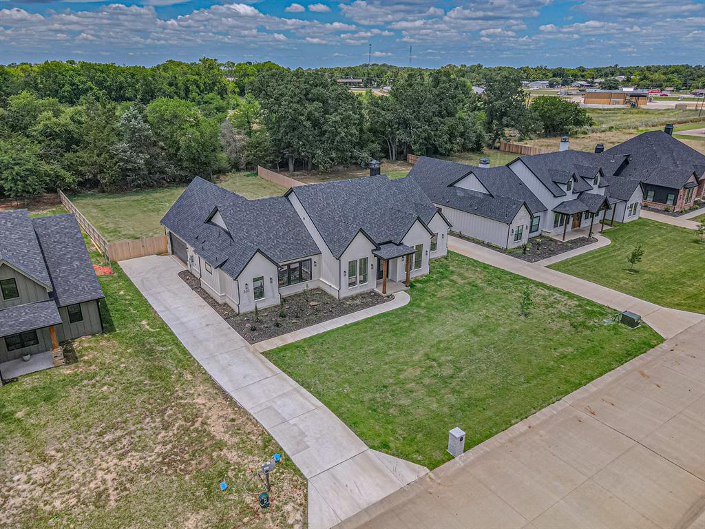 360 Dalton Road Canton, TX 75103 - Photo 29 of 33 Contemporary-style residence with a dark shingle roof and light-colored siding