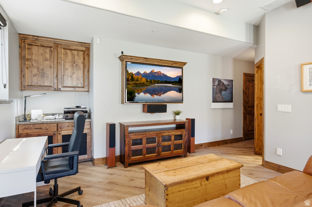 3148 Lower Saddleback Road Park City, UT 84098 - Photo 10 of 67 Dedicated workspace featuring built-in wood cabinetry and a stone-finish countertop