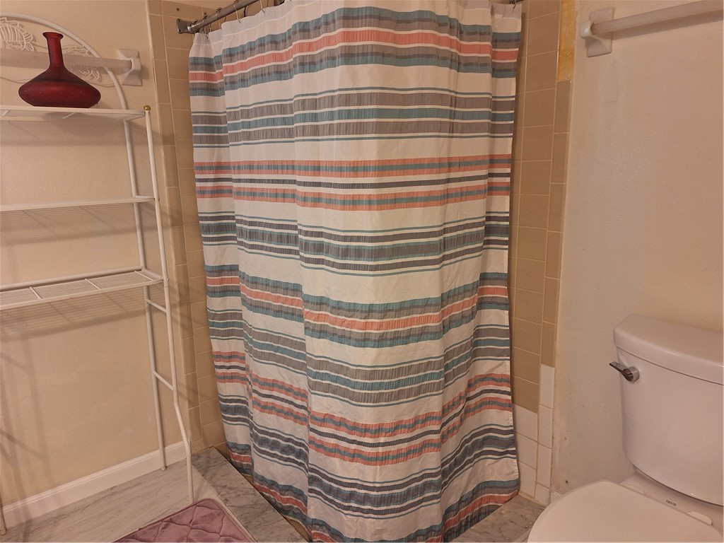 999 Laredo Lane Sebastian, FL 32958 - Photo 14 of 19 a bathroom with a sink and a toilet