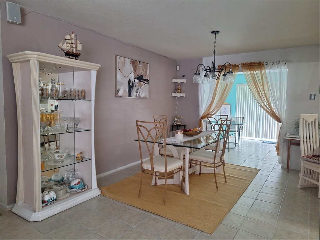 999 Laredo Lane Sebastian, FL 32958 - Photo 7 of 19 a view of a dining room with furniture