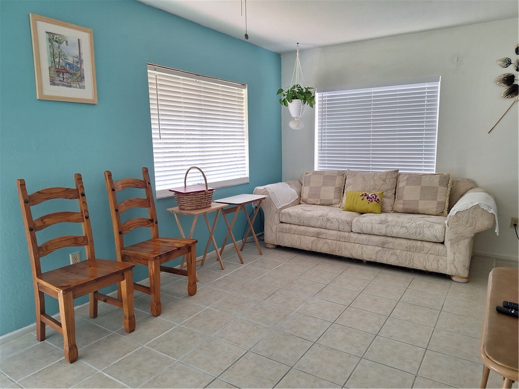 999 Laredo Lane Sebastian, FL 32958 - Photo 9 of 19 a living room with furniture and a large window