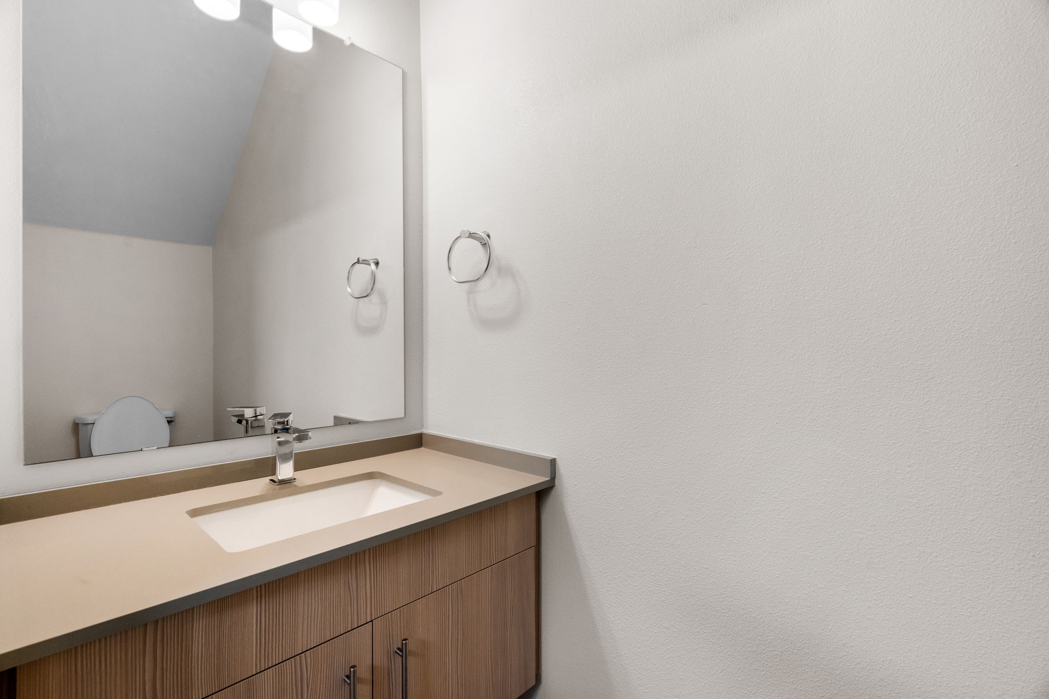 7805 Cooper Lane, Unit 606 Austin, TX 78745 - Photo 18 of 35 a bathroom with a sink and a mirror