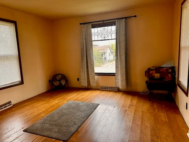 a view of an empty room and window