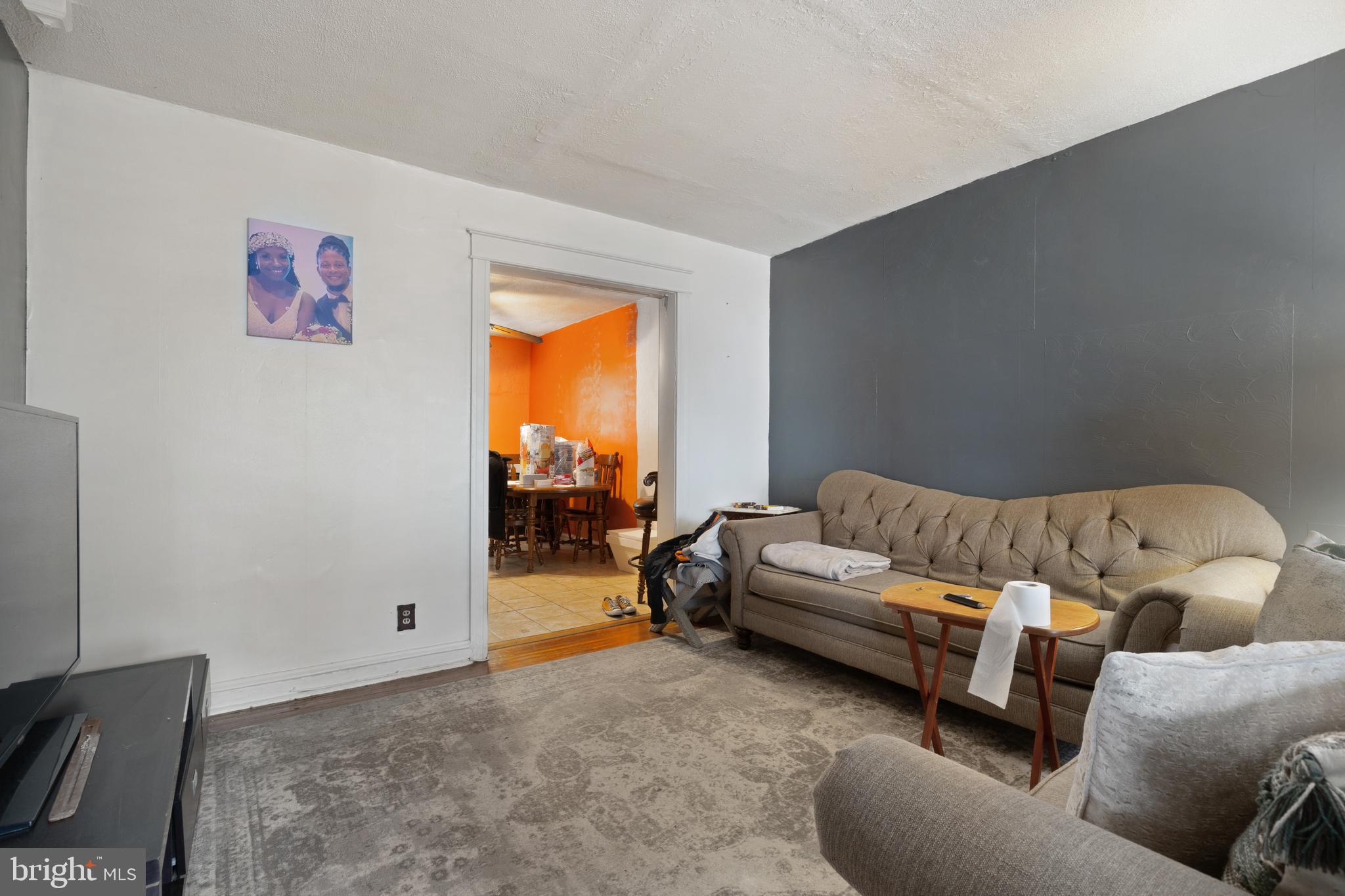 414 Hampden Road Upper Darby, PA 19082 - Photo 3 of 11 a living room with furniture and a window