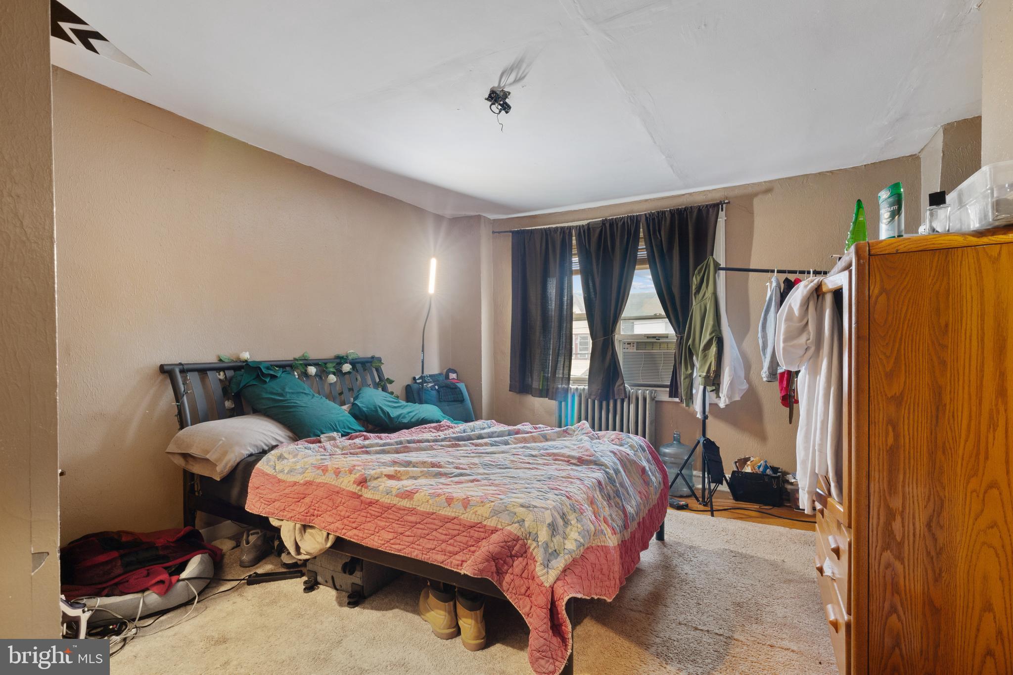 414 Hampden Road Upper Darby, PA 19082 - Photo 6 of 11 a bedroom with a bed and a window