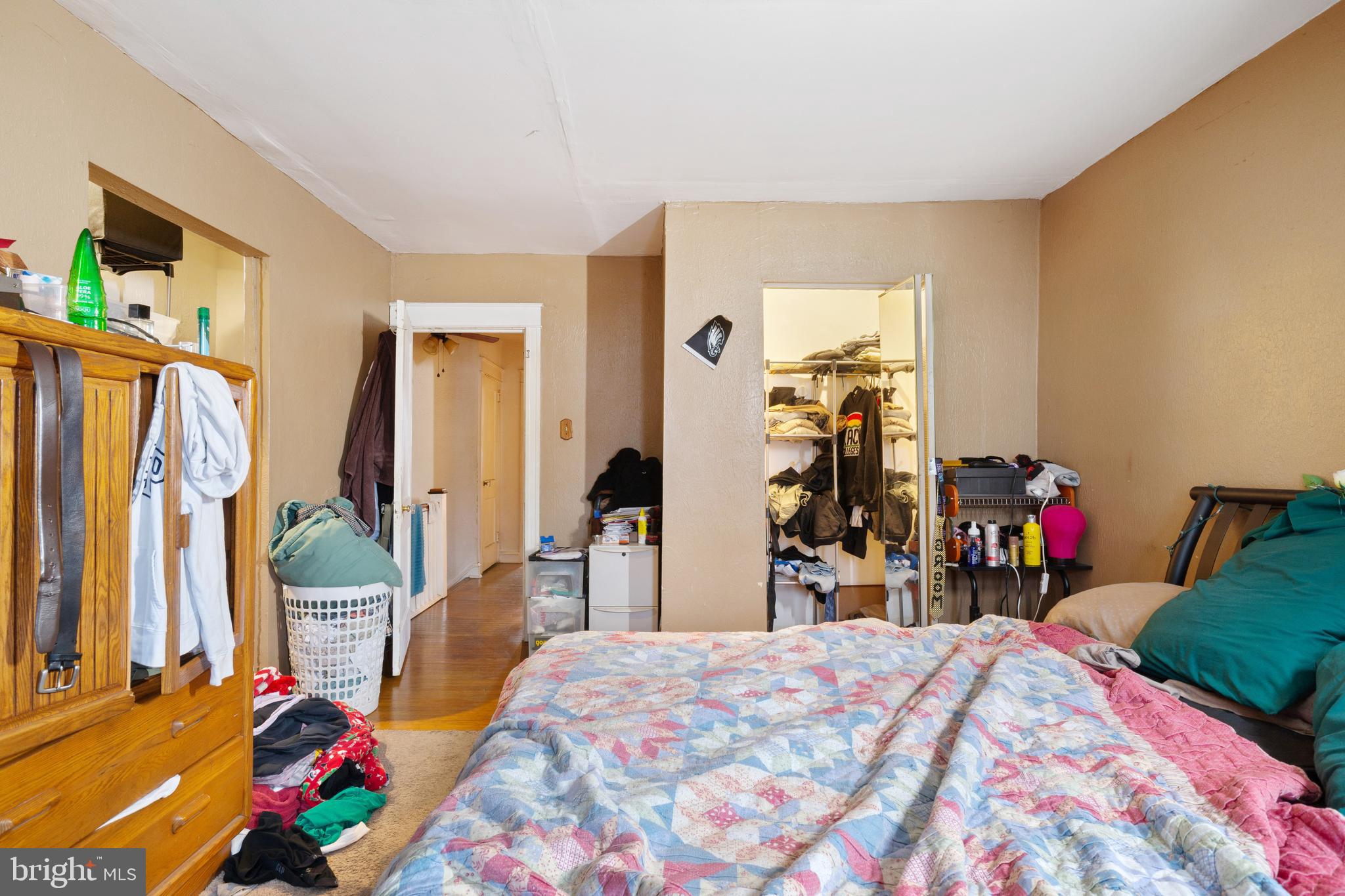 414 Hampden Road Upper Darby, PA 19082 - Photo 7 of 11 a bedroom with bed and a chair