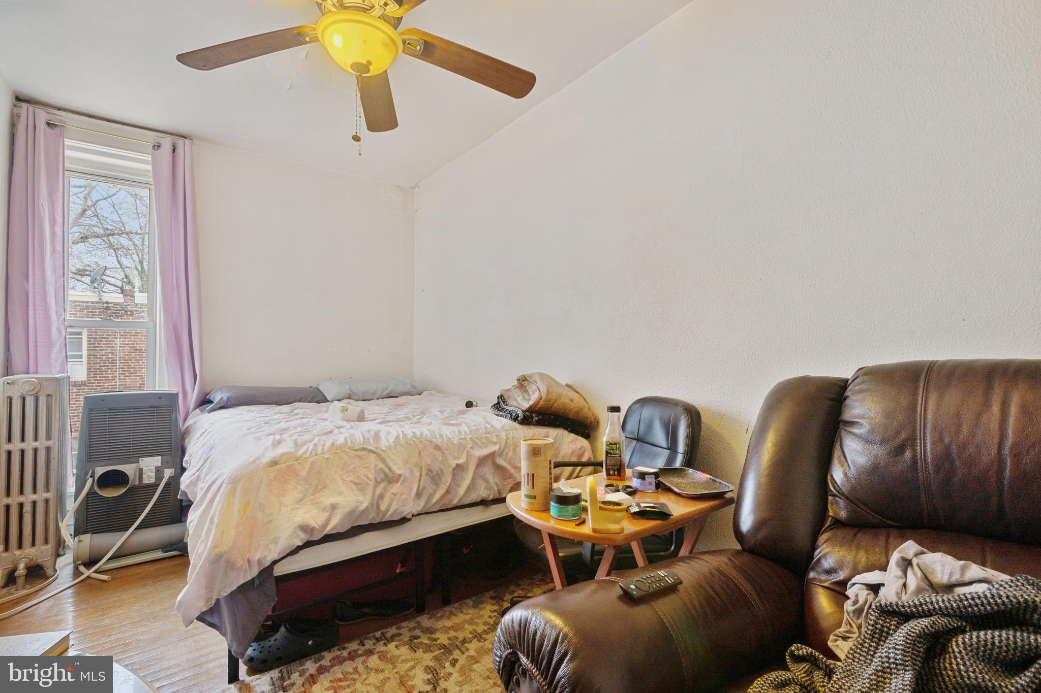 414 Hampden Road Upper Darby, PA 19082 - Photo 8 of 11 a bedroom with bed and a window